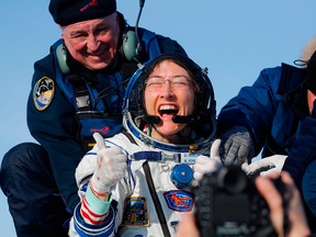 NASA astronaut Christina Koch reacts shortly after landing in a remote area outside the town of Dzhezkazgan (Zhezkazgan), Kazakhstan, on Feb. 6, 2020.