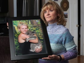Martine Rhéaume poses with a photo of her daughter Mallory Morton-Rhéaume  In Ottawa Thursday Feb 20, 2020. Martine Rhéaume's daughter, Mallory Morton-Rhéaume, was taken off life support in January, a week shy of her 30th birthday.