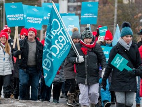 Teachers from the Ontario English Catholic Teachers Association picket along Merivale Road in Ottawa as part of a  one-day, province-wide strike on Feb. 4, 2020.