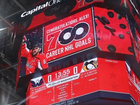 A detailed view of the scoreboard congratulating Alex Ovechkin #8 of the Washington Capitals on scoring his 700th career goal as the Washington Capitals play the Pittsburgh Penguins during the first period at Capital One Arena on Sunday.