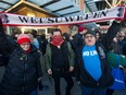 Protesters on behalf of Wet'suwet'en blockade nation block Commercial and Broadway in Vancouver, Feb. 19, 2020. (Arlen Redekop / PNG staff photo)