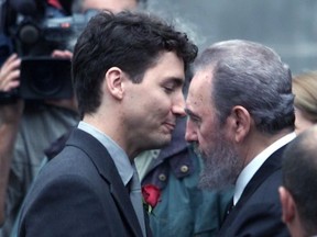 Justin Trudeau hugs Cuba's Fidel Castro in October, 2000. Trudeau has been criticized for his praise of the now-dead communist dictator. (Montreal Gazzette/Pierre Obendrauf)