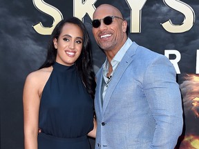 Dwayne Johnson and his daughter Simone Garcia Johnson attend the "Skyscraper" New York Premiere at AMC Loews Lincoln Square on July 10, 2018, in New York City.
