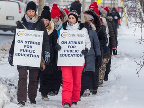 Educators from the public system walk the picket line on Greenbank Road in Ottawa on Friday, Feb. 28, 2020. Errol McGihon/Postmedia