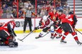 Valeri Nichushkin of the Colorado Avalanche drives to the net as Senators’ Nick Paul tries to slow him down during the second period of Thursday night’s game at the Canadian Tire Centre. (WAYNE CUDDINGTON/POSTMEDIA NETWORK)