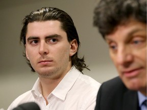 Former University of Ottawa hockey player Andrew Creppin, left, with criminal lawyer Lawrence Greenspon. when the lawsuit was announced in January 2015.
