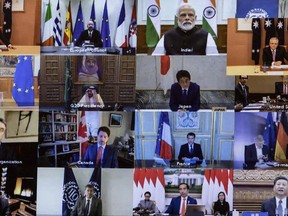 A view of members taking part on screen during an unusual G20 Leaders Summit to discuss the international coronavirus crisis on March 26, 2020 in Canberra, Australia.