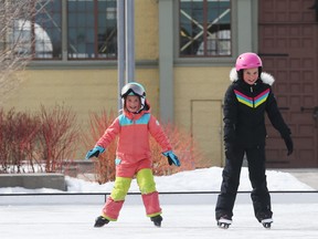 The Merkel family skate on the outdoor skating rink at Lansdowne Park in Ottawa, March 18, 2020.