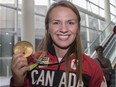 Erica Wiebe shows off her 2016 Olympic gold medal after returning to Canada from the Rio Summer Games. Wiebe will be in Ottawa this weekend for a final qualifying competition for the 2020 Tokyo Summer Games.