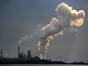 Steam rises from a plant in an industrial zone in Hamilton, Ontario, Canada May 13, 2017. Picture taken May 13, 2017. REUTERS/Chris Helgren/File Photo