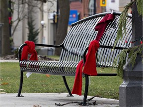 Red scarves were tied to trees and benches throughout Victoria Park by The AIDS Network of Hamilton, Halton, Haldimand, Norfolk and Brant on World AIDS Day in December 2016 in downtown Brantford, Ont. The Red Scarf Campaign attempts to end discrimination and the stigma of AIDS.