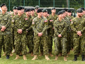 Canadian soldiers take part in the opening ceremony of the international military exercises in Starytchi, outside Lviv on September 3, 2018.