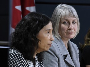 Minister of Health Patty Hajdu listens as Chief Public Health Officer of Canada Dr. Theresa Tam speaks during an update on coronavirus disease (COVID-19) at the National Press Theatre in Ottawa, on Wednesday, March 4, 2020.