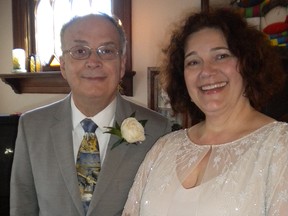 David and Elena Crenna pose for a photo at their wedding in this 2012 handout photo.