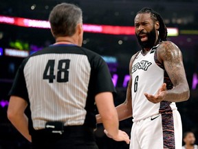DeAndre Jordan of the Nets argues a call with referee Scott Foster during first half NBA action against the Lakers at Staples Center in Los Angeles, on March 10, 2020.