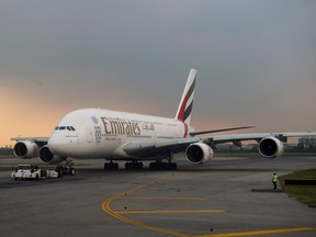 A file photo taken on July 25, 2016 shows an Emirates Airlines Aibus A380-800 on the runway of Bangkok's Suvarnabhumi airport. (ROMEO GACAD/AFP via Getty Images)