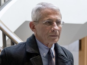 In this March 4, 2020, file photo, Anthony Fauci, director of the National Institute of Allergy and Infectious Diseases (NIAID), arrives at the U.S. Capitol to brief Congressional Democrats and Republicans in separate closed-door meetings on recent developments with the novel coronavirus, or COVID-19, in Washington, D.C.