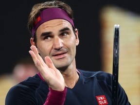 Switzerland's Roger Federer reacts after winning his match against Serbia's Filip Krajinovic at the Australian Open. (REUTERS/Kai Pfaffenbach)