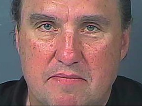 Pastor Rodney Howard-Browne of The River at Tampa Bay Church is seen in a Hernando County Detention Center booking photo after he was arrested on charges of violating quarantine orders and unlawful assembly, in Brooksville, Florida, March 30, 2020. (Hernando County Detention Center/Handout via REUTERS)