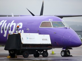 A Flybe aircraft is pictured on the tarmac at Exeter airport in south-west England on March 5, 2020, following the news that the airline had collapsed into bankruptcy.