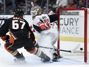 Anaheim Ducks center Rickard Rakell scores a goal on Ottawa Senators goalie Marcus Hogberg during the second period at Honda Center on Tuesday.