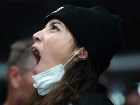A  Los Angeles Kings fan wears a surgical mask in the first period during a game against the Ottawa Senators at Staples Center on Wednesday, March 11, 2020.