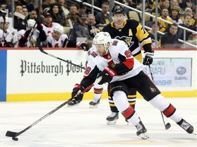 Ottawa Senators right wing Connor Brown moves the puck up ice against the Pittsburgh Penguins during the third period at PPG PAINTS Arena, Dec. 30, 2019.