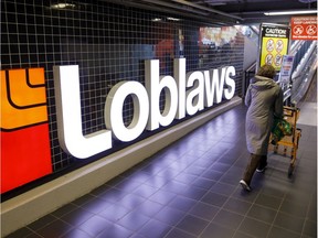 A file photo of a shopper entering a Loblaw Cos. grocery store in Toronto.