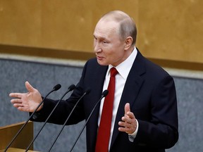 Russia's President Vladimir Putin delivers a speech during a session of the lower house of parliament to consider constitutional changes in Moscow, Russia, March 10, 2020.