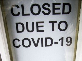 A sign on tghe front door of the Blackburn Arms Pub Restaurant on Saturday.