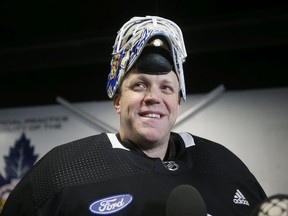 David Ayres is greeted by fans and the media before taking to the ice at the The Ford Performance Centre on Sunday February 23, 2020.