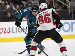 San Jose Sharks winger Timo Meier takes a shot against Ottawa Senators defenceman Christian Wolanin in San Jose, Calif., on Saturday night. AP