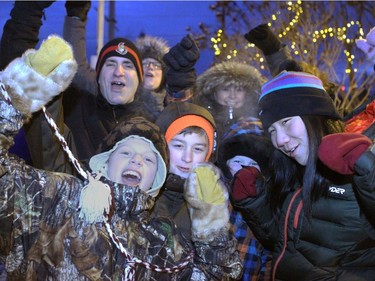 WHITEHORSE, YUKON. NOVEMBER 21,  2012 --- Fans waiting to get into the game in Whitehorse.  The Northern Lights Dream Tour wound up Wednesday with a final game in Whitehorse, Yukon, followed by long flights home on Thursday for the players - many with three connections and 15 to 20 hours in the air.  (JULIE OLIVER/OTTAWA CITIZEN/) #111075. Ken Warren.