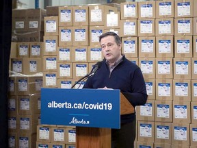 Alberta Premier Jason Kenney speaks in the AHS Edmonton Distribution Centre on Saturday, April 11, 2020, about the province sending supplies to British Columbia, Ontario and Quebec to help address unprecedented demand in those provinces for personal protective equipment (PPE) and ventilators.