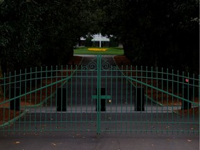 A view of the locked gates at the entrance of Magnolia Lane off Washington Road that leads to the clubhouse of Augusta National on March 30, 2020 in Augusta.