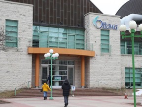 A March photo of an entrance to Ottawa City Hall.