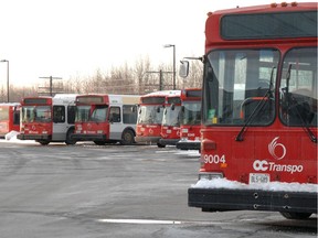 FILE: Buses sit in the yard.