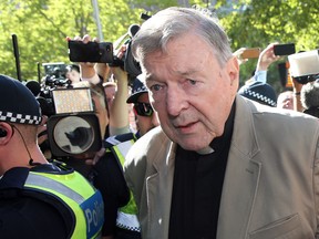 This file photo taken on Feb. 27, 2019 shows Australian Cardinal George Pell making his way to the court in Melbourne. (CON CHRONIS/AFP via Getty Images)
