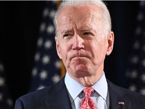 In this file photo taken on March 12, 2020 former US Vice President and Democratic presidential hopeful Joe Biden speaks about COVID-19, known as the Coronavirus, during a press event in Wilmington, Delaware.