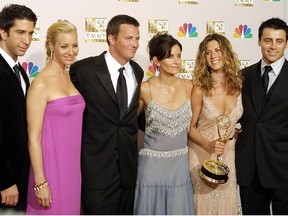 In this file photo taken on September 21, 2002 cast members from "Friends," which won Outstanding Comedy, series pose for photogarpher at the 54th Annual Emmy Awards at the Shrine Auditorium in Los Angeles . From L to R are David Schwimmer, Lisa Kudrow, Mathew Perry, Courtney Cox Arquette, Jennifer Aniston and Matt LeBlanc.