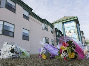 Flowers are shown outside Maison Herron, a long term care home in the Montreal suburb of Dorval, Sunday, April 12, 2020, as COVID-19 cases rise in Canada and around the world.