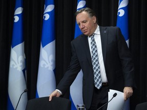Quebec Premier Francois Legault arrives at a news conference on the COVID-19 pandemic, Friday, April 24, 2020 at the legislature in Quebec City.