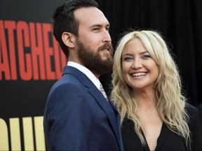 Danny Fujikawa and actress Kate Hudson attend the world premiere of "Snatched" at the Regency Village Theater, on May 10, 2017 in Westwood, Calif.