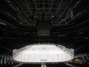 A view of the ice inside an empty Capital One Arena.