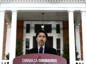 Prime Minister Justin Trudeau speaks during his daily press conference on COVID-19 in front of his residence at Rideau Cottage in Ottawa, on Sunday.