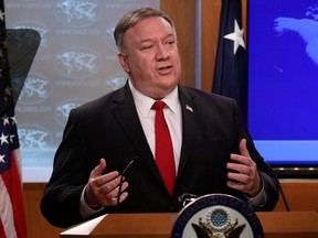 U.S. Secretary of State Mike Pompeo addresses a news conference at the State Department in Washington, D.C., Tuesday, April 7, 2020.