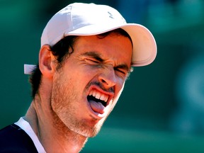 Andy Murray of Britain reacts after missing a point against France's Benoit Paire at the Monte Carlo Masters in Monaco. on April 14, 2016 .