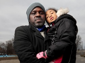 Obi Ifedi and his daughter Zoe pose for a photo at Michelle Park in Ottawa on Wednesday, April 8, 2020.