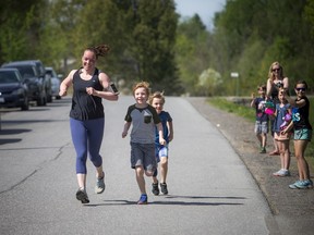 Hester Potts ran a half-marathon in honour of her father who passed away last fall from COPD, part of the virtual Ottawa Race Weekend, on Sunday. Potts ran the last stretch with two of her three sons, eight-year-old Euan and six-year-old Lachlan.