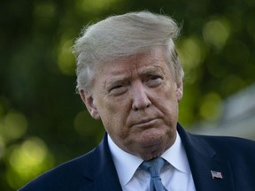 U.S. President Donald Trump speaks to reporters before boarding Marine One on the South Lawn of the White House on May 15, 2020 in Washington, DC.